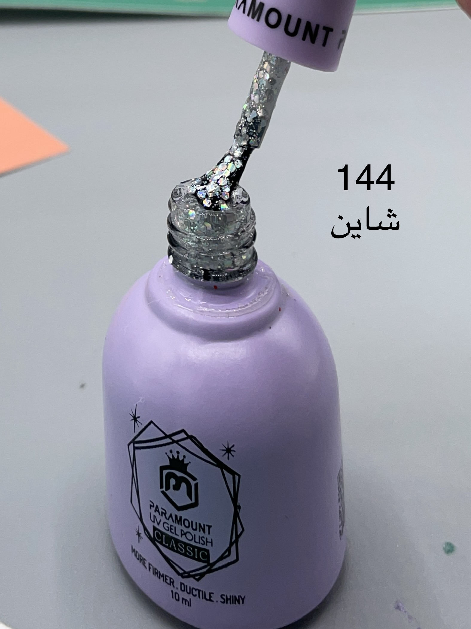 لاک ژل پارامونت ۱۰ میل paramount کد ۱۴۴  نقره ای شاینی